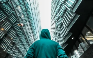 person comparing diy and professional camera installation security options